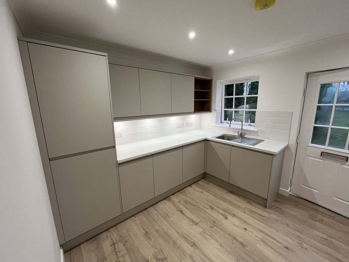 A handleless fitted kitchen installed by Concept Joiners in Bishopbriggs, East Dunbartonshire Trusted Trader member