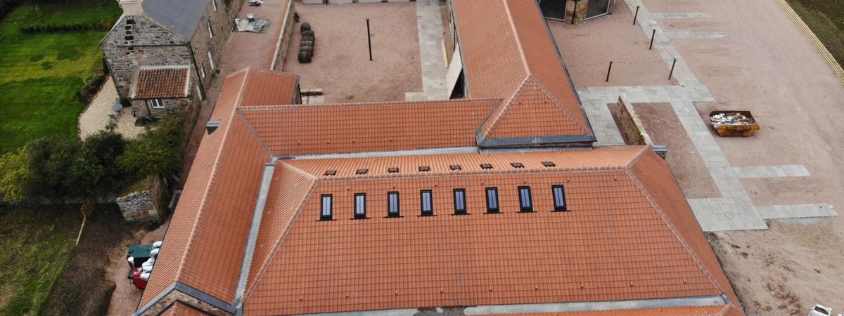The finished Fallside Mill steading roof near St Andrews, re-roofed in clay pantiles by Ian Barrett Roofing, Fife Trusted Trader member